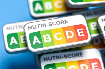 Danone has removed Nutri-Score from the packaging of key drinkable products. Image Source: Getty Images/aprott