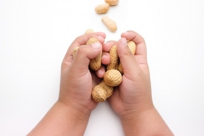 Early peanut exposure reduces allergy risk by 71%. GettyImages/Tanawut Punketnakorn